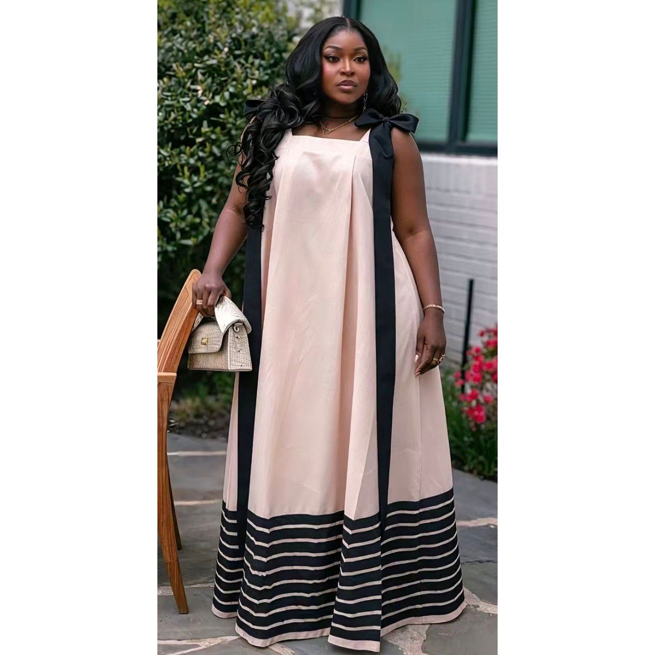 Tie Shoulder Straps And Striped Detail Along The Bottom Hem