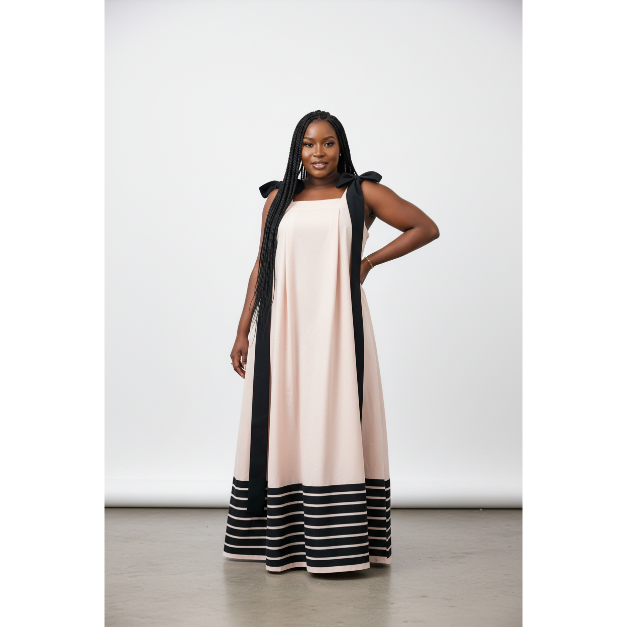 Tie Shoulder Straps And Striped Detail Along The Bottom Hem