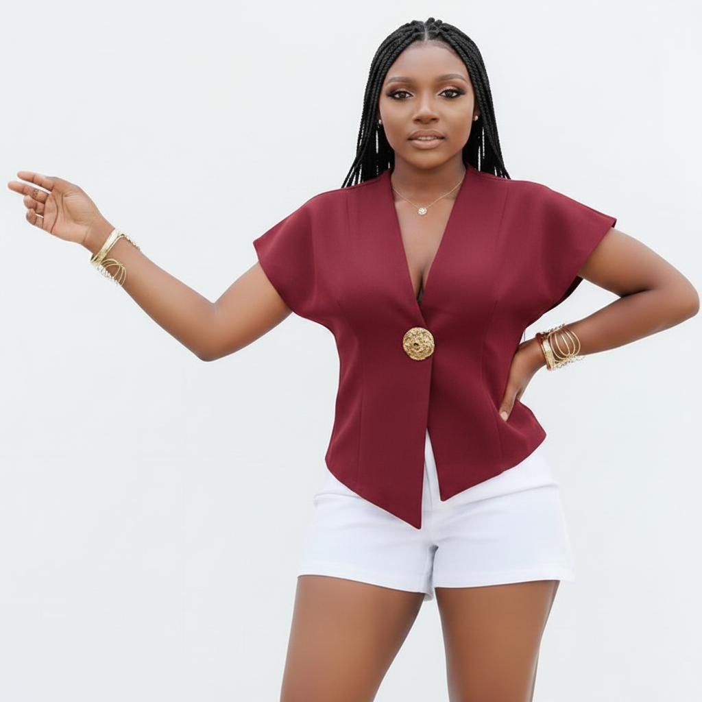 Asymmetrical Hem Short Jacket and a golden-tone button detail.