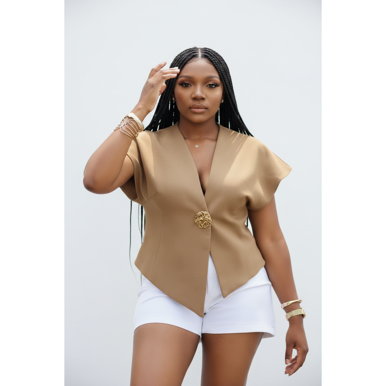 Asymmetrical Hem Short Jacket and a golden-tone button detail.