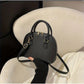 Mini Crocodile Embossed Dome Handbag.