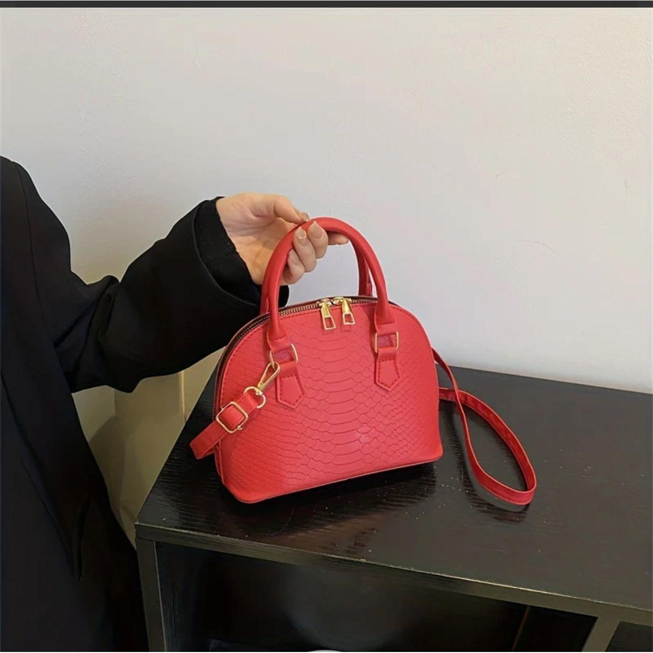 Mini Crocodile Embossed Dome Handbag.