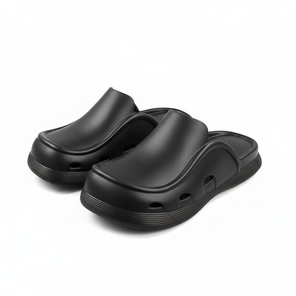 Thick bottom closed toe porous shoes.