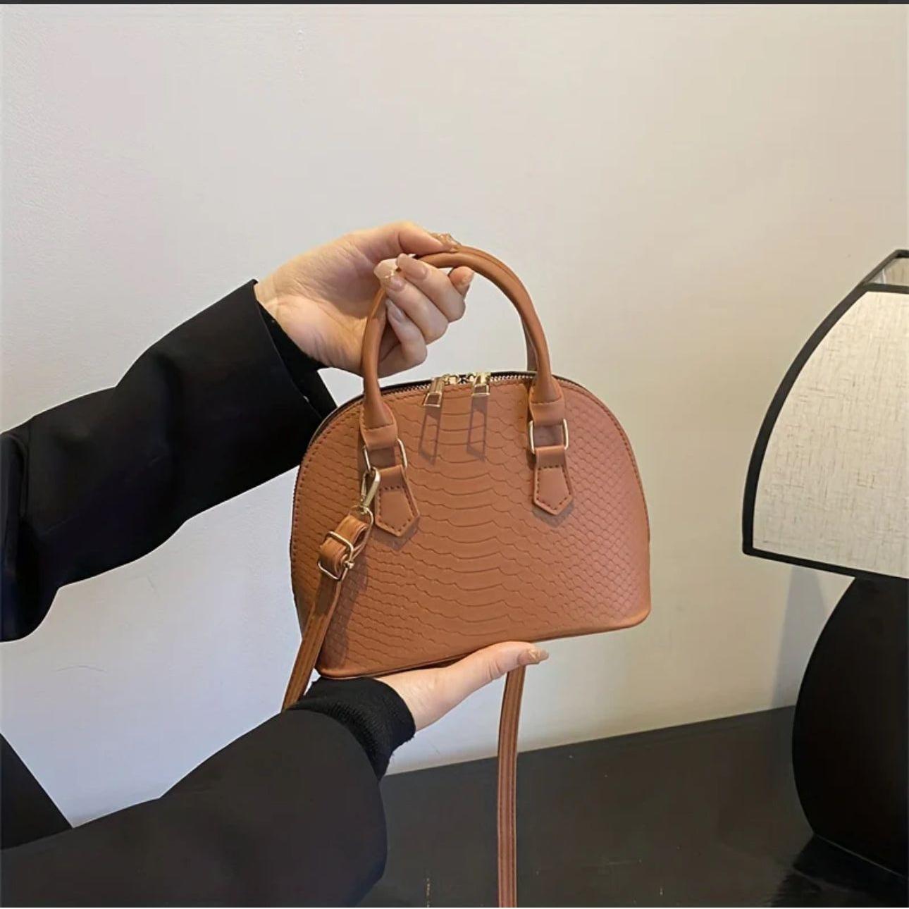 Mini Crocodile Embossed Dome Handbag.