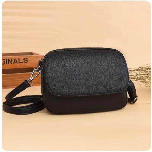 Designer Smooth Finish Mini Crossbody bag.