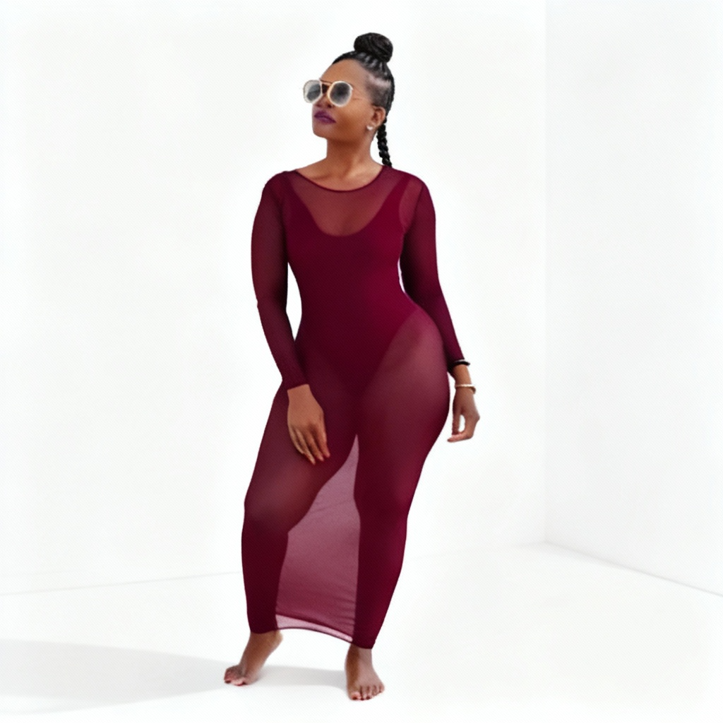 Woman wearing a burgundy sheer dress on a white background