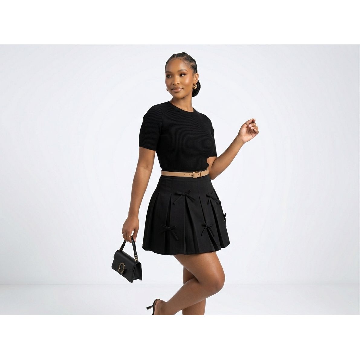 Pleated Mini Skirt with Bow Accents – Feminine & Chic