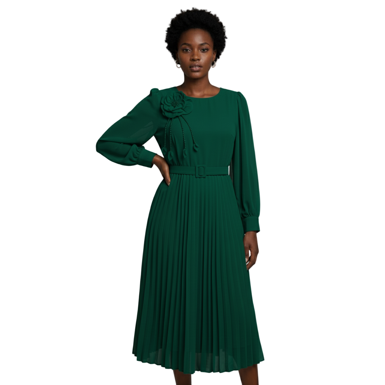 Woman wearing a green dress with a floral detail on a gray background