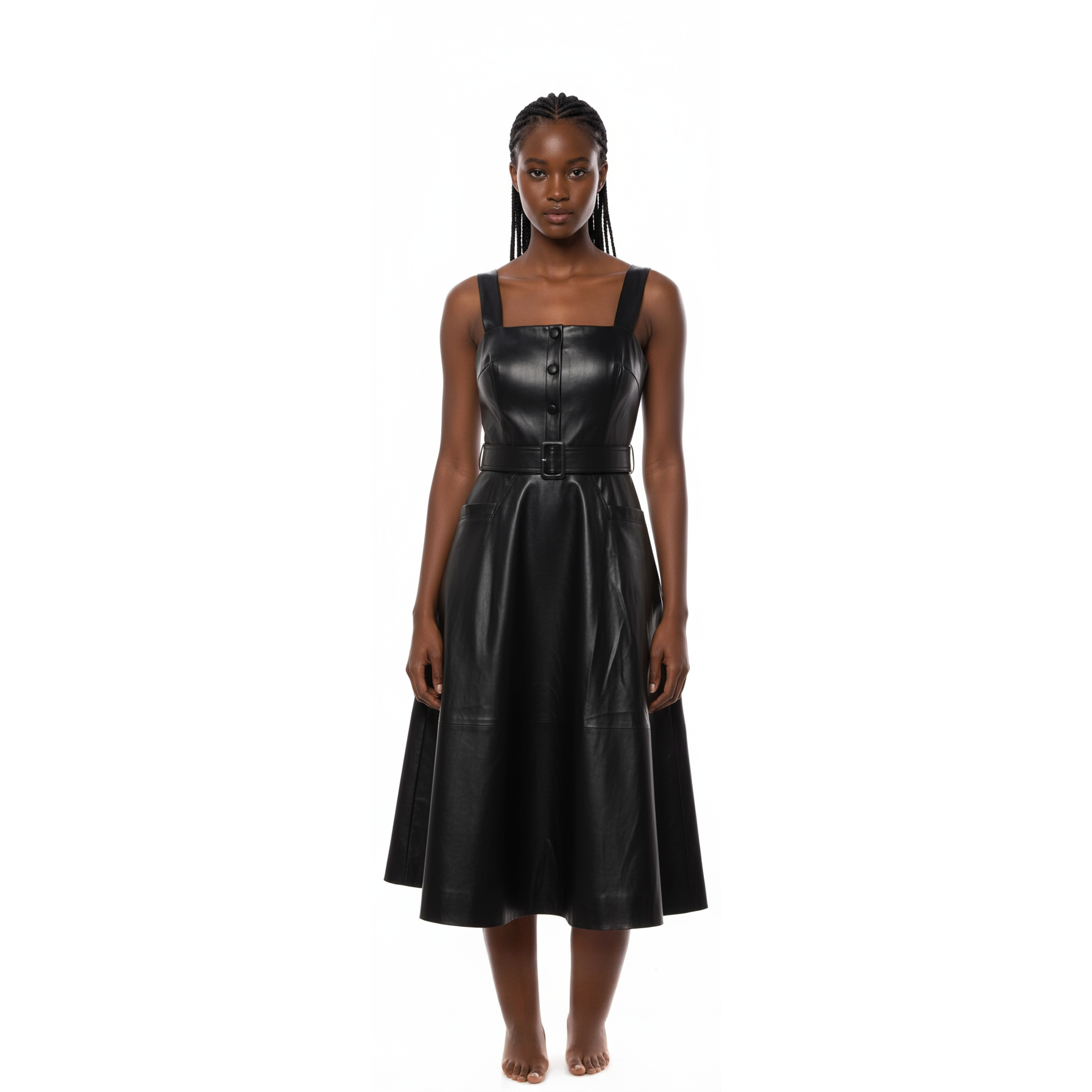 Black leather dress on a mannequin against a white background