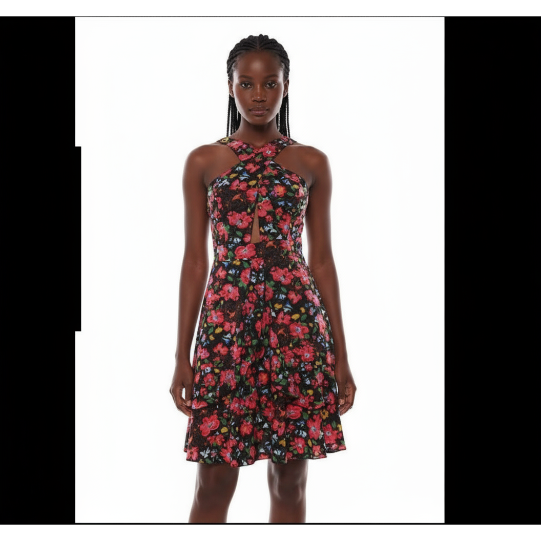Floral dress on a mannequin against a white background