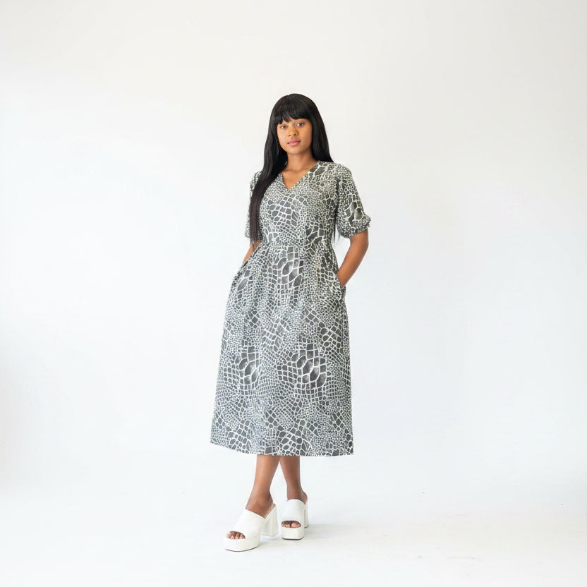 There Quarter Sleeve V-Neck Dress