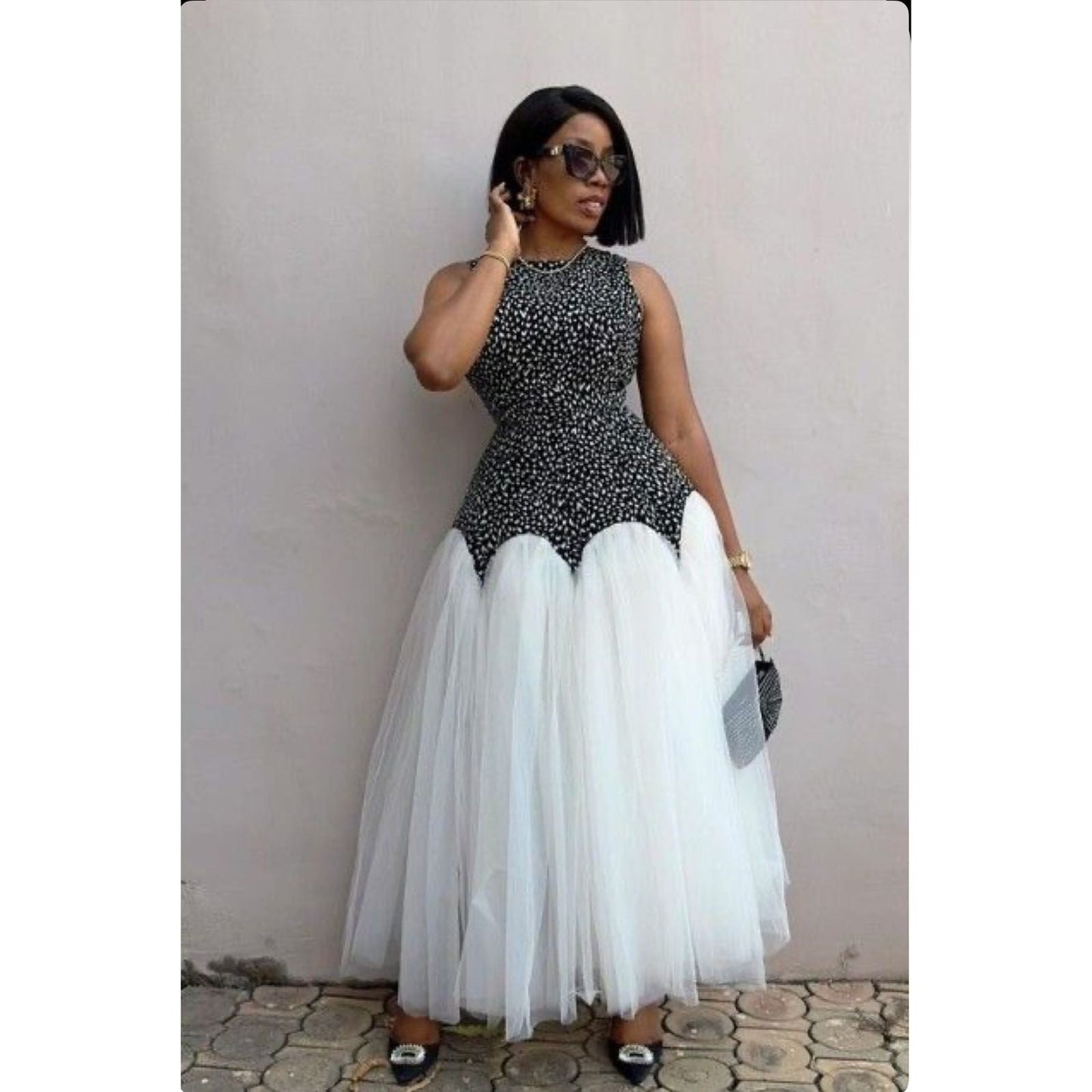 Sleeveless Mermaid Tule Dress.