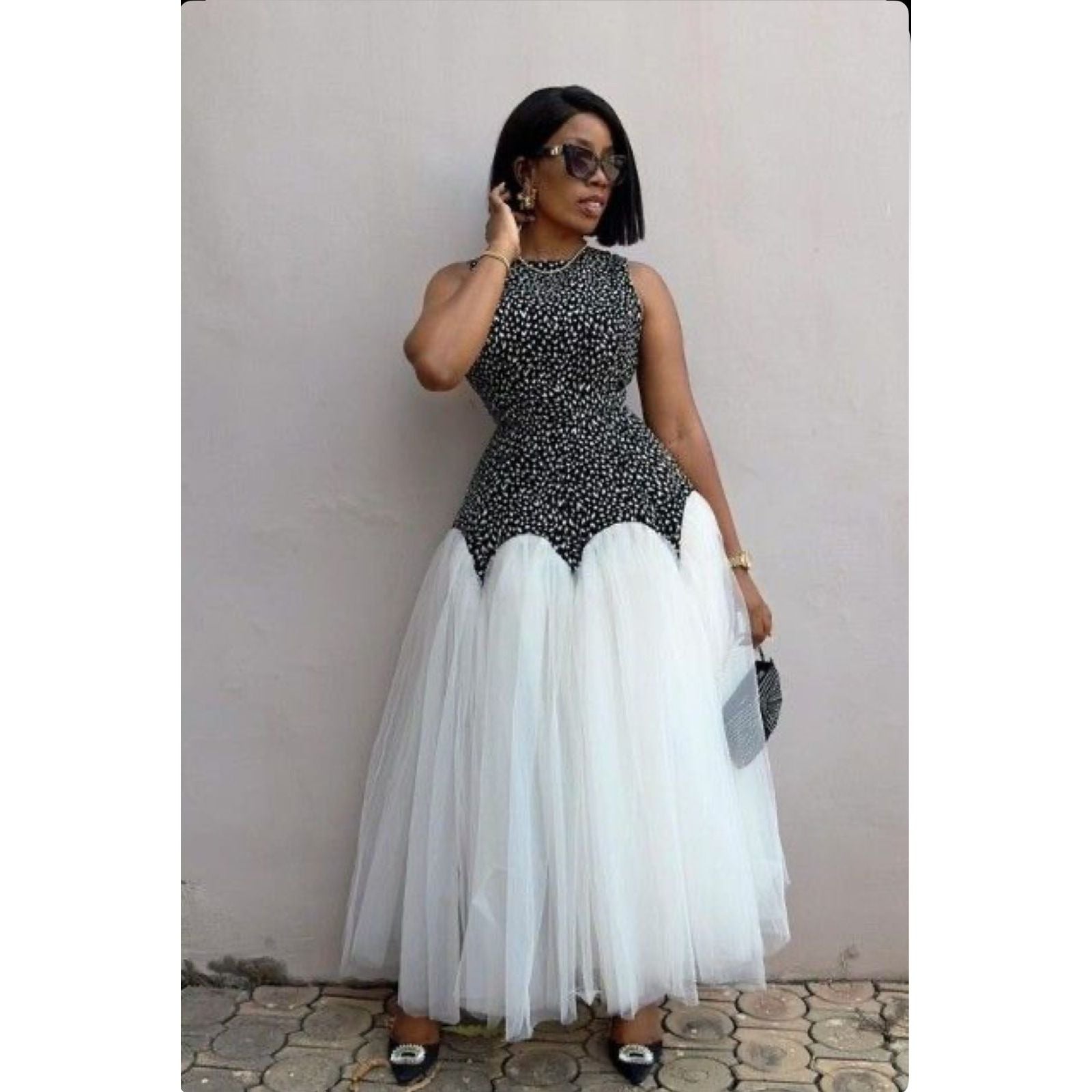 Sleeveless Mermaid Tule Dress.