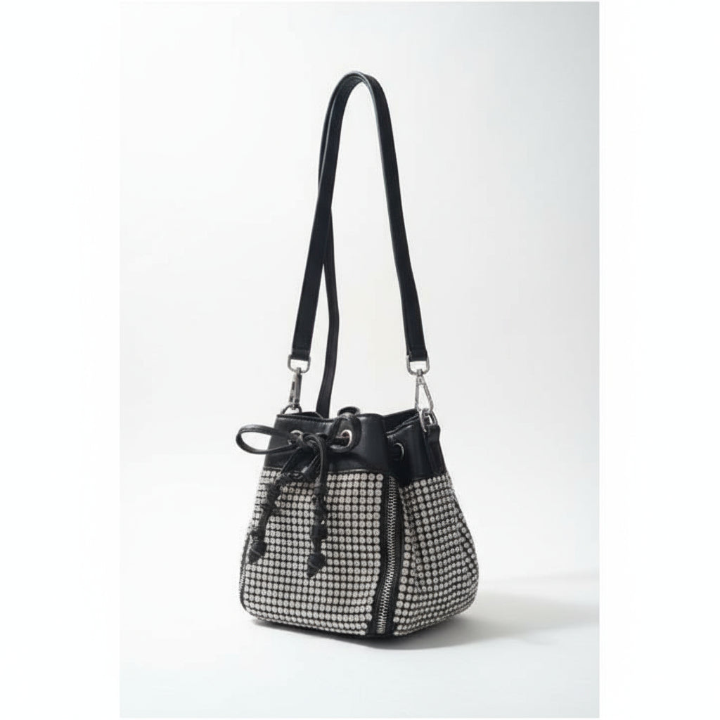 A faux leather crossbody shoulder bag with crystal embellishments and a crystal top handle, in black color.