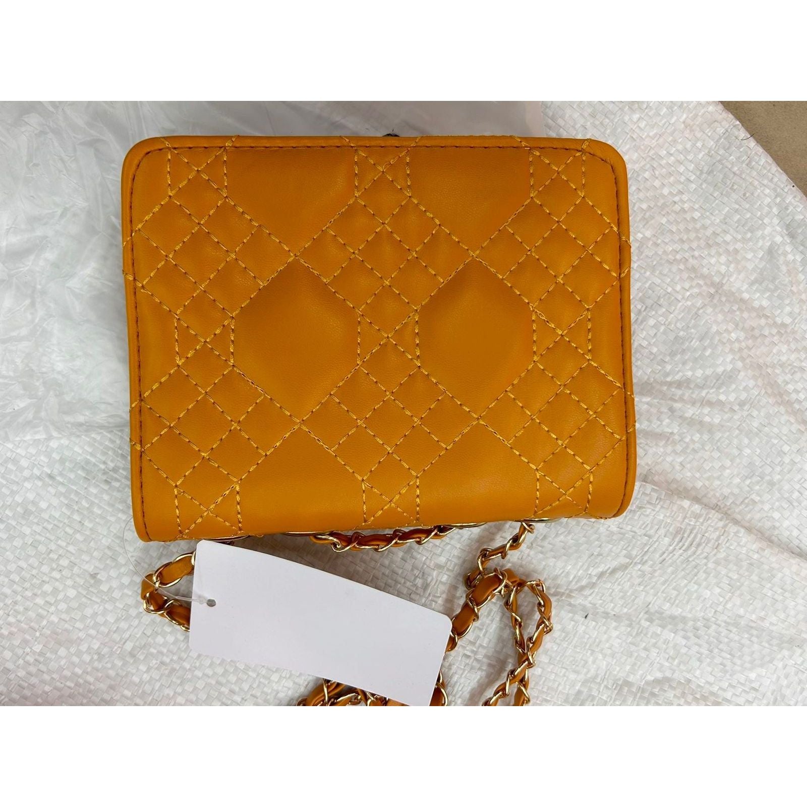 Embroidery Faux Leather Quilted Fabric Handbag.