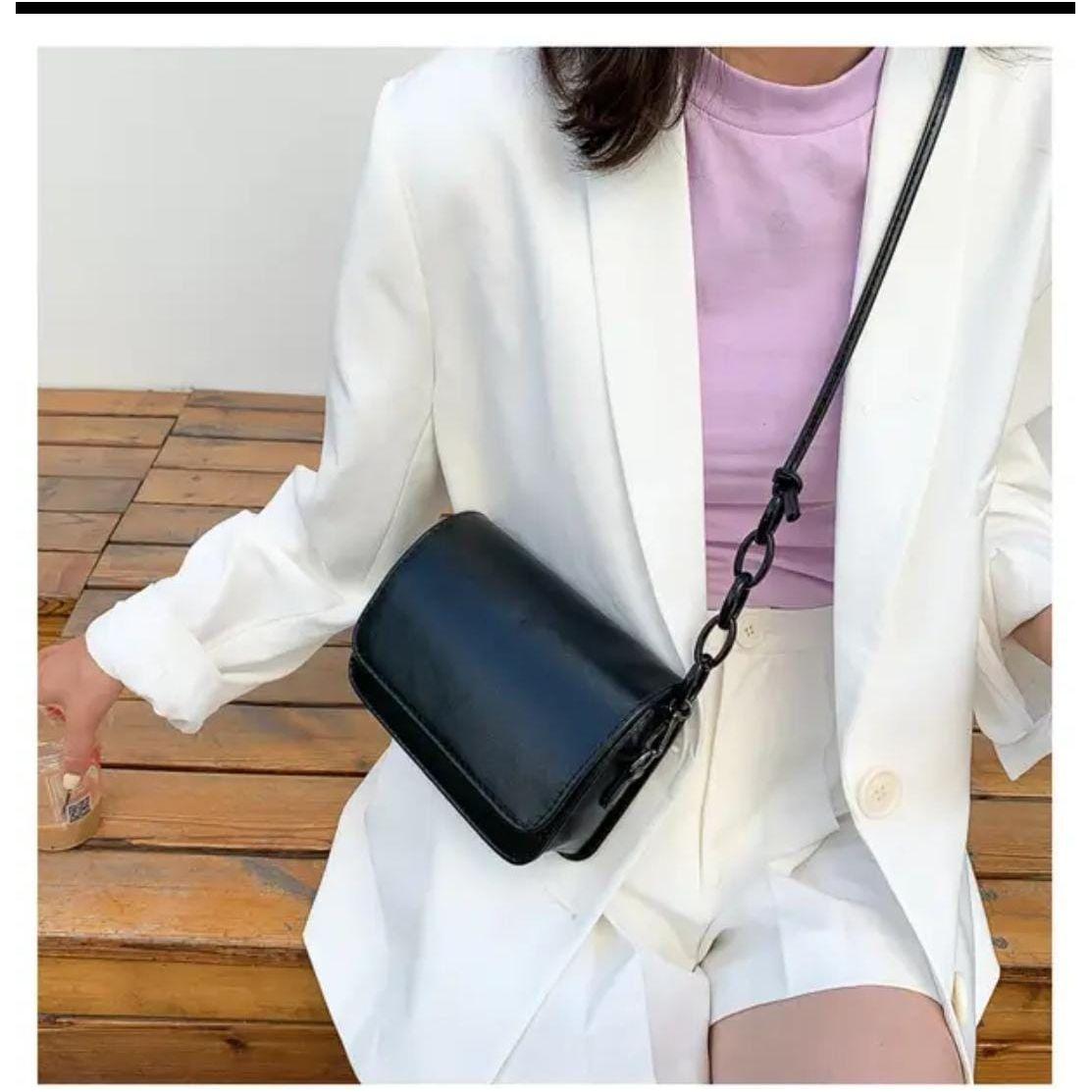 Designer Smooth Finish Mini Crossbody bag.