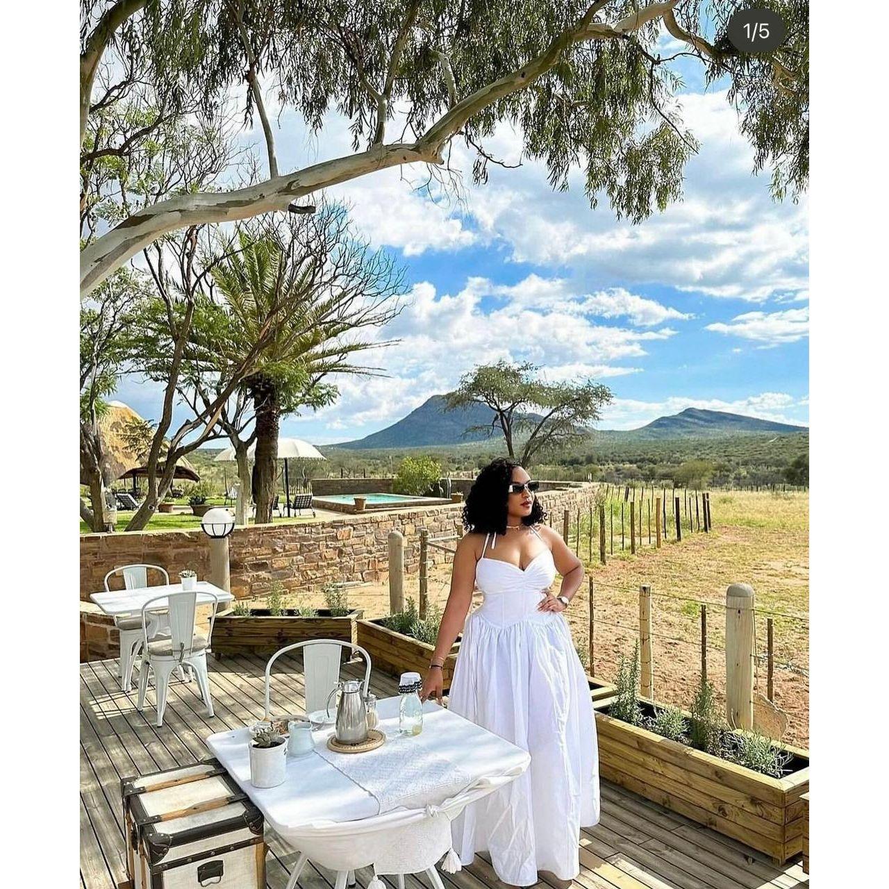 Spaghetti strap Lace Up Midi Dress.