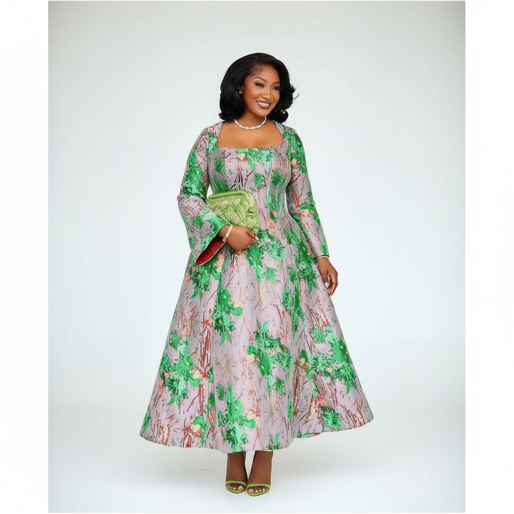 Woman in a floral dress standing in front of a white door with a plant in the background