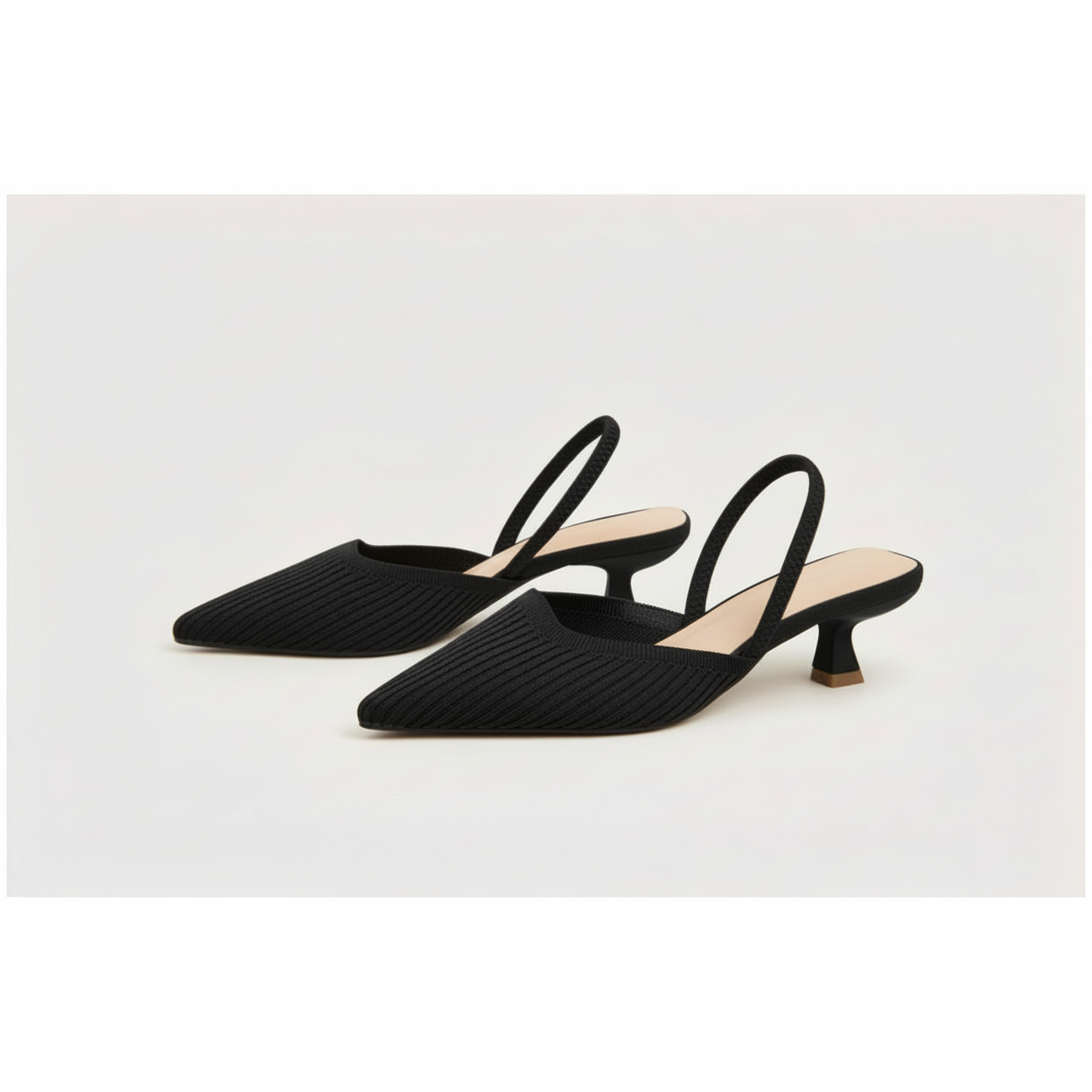 Kitten heel slingback pumps