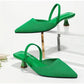 Kitten heel slingback pumps