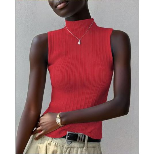 Person wearing a red sleeveless top with a plain background