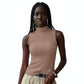 Person wearing a brown ribbed sleeveless top against a neutral background