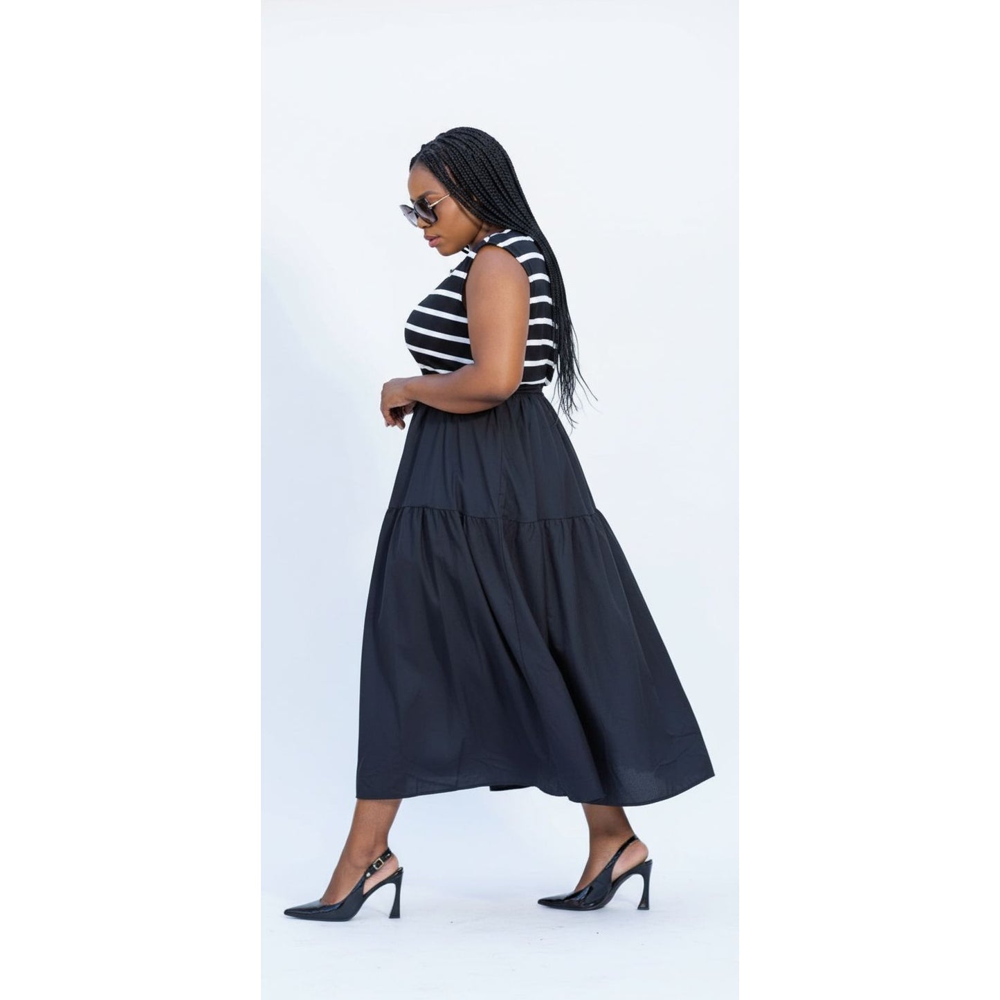 Striped top and a Black Tiered Midi Dress with a Waist Tie and Pockets.