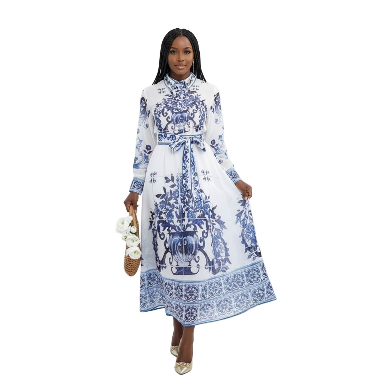 Woman wearing a white dress with blue floral patterns on a white background