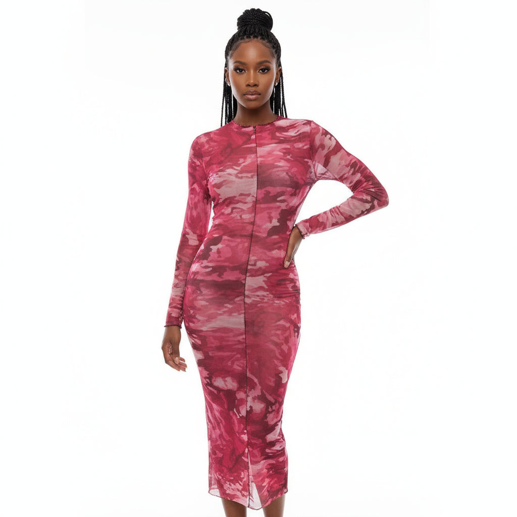 Red and white patterned dress on a mannequin against a white background