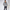 Person wearing a houndstooth pattern jacket on a white background