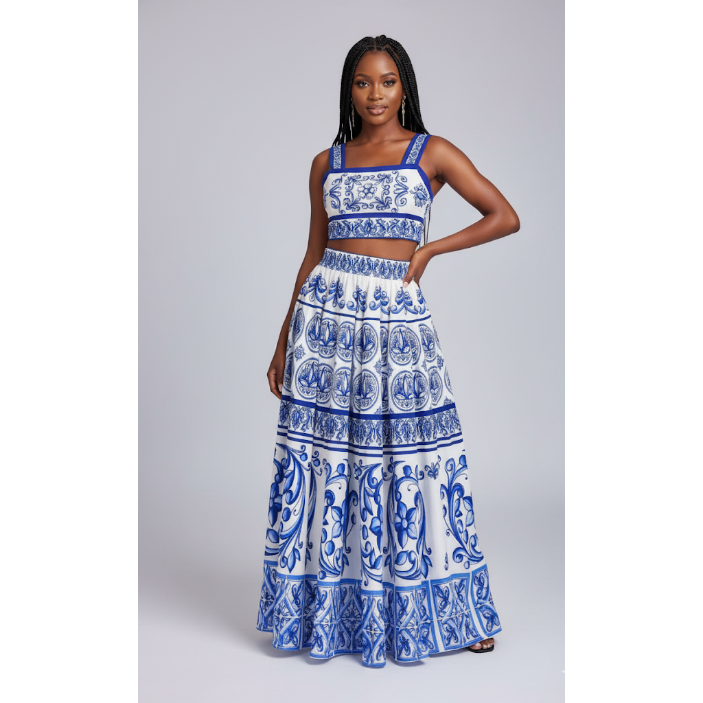 Woman wearing a blue and white patterned dress on a gray background