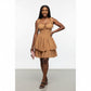 A Short Tiered Dress With Thin Straps