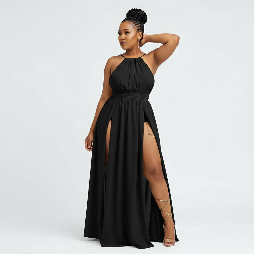 A person wearing a sleeveless, open back, maxi dress in a solid color, posing against an outdoor backdrop.