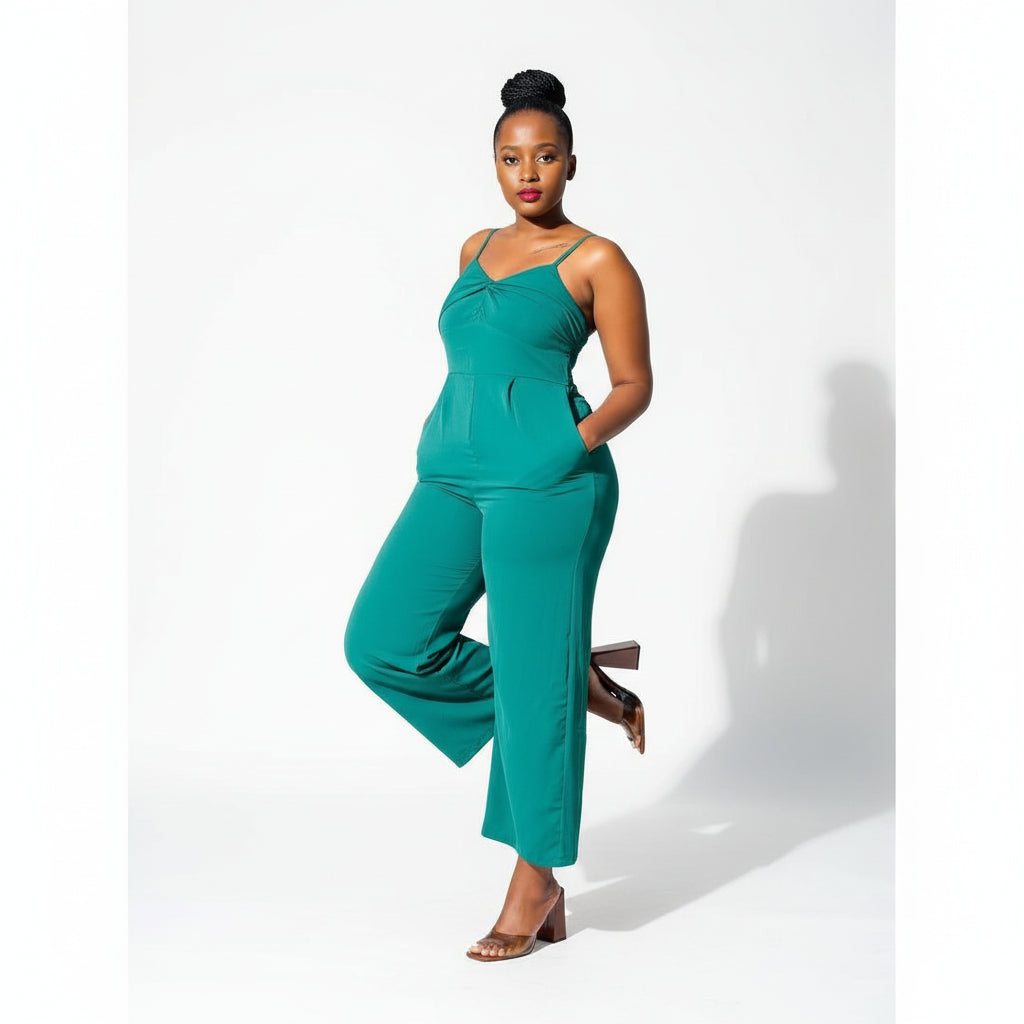 Asymmetrical off-the-shoulder twisted jumpsuit.
