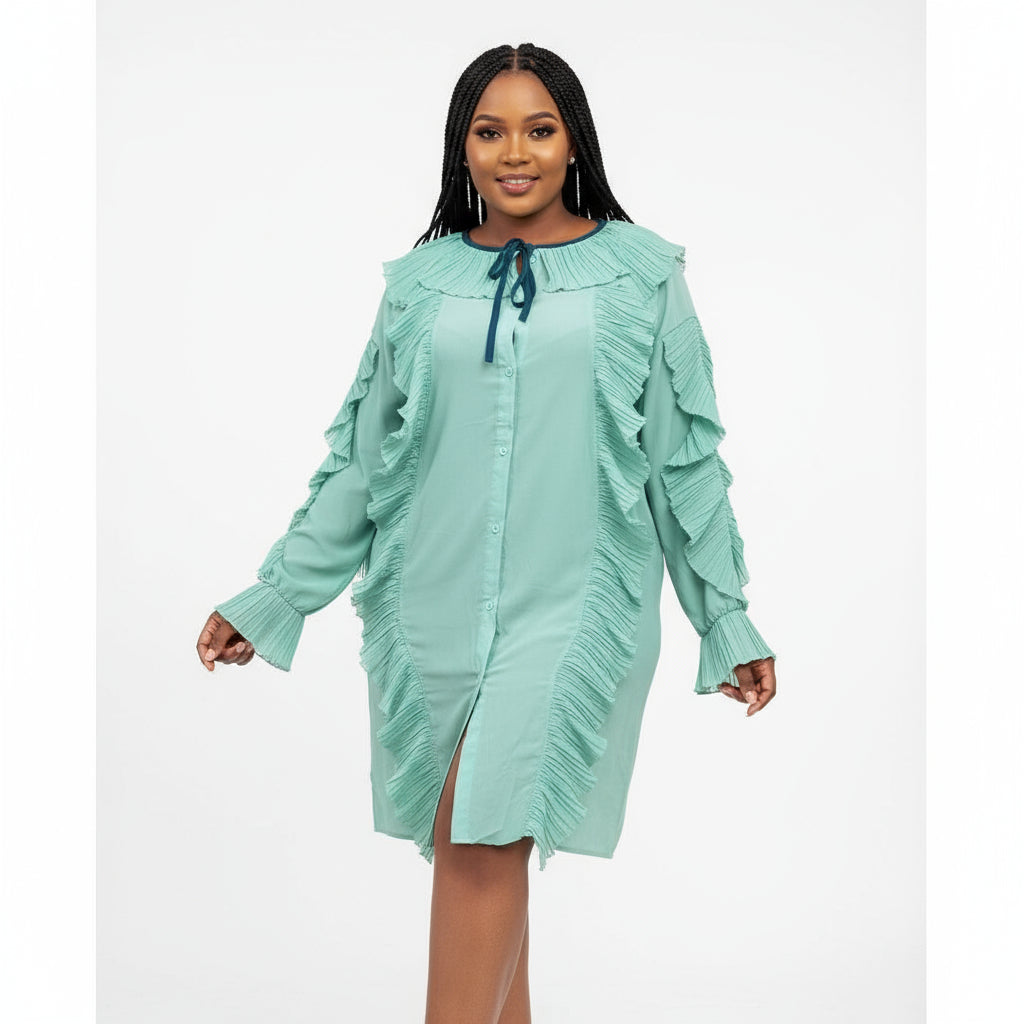 A person wearing a green tie neck vintage dress with long sleeves and a mini skirt length.