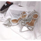 Pointed toe buckel strap high heel